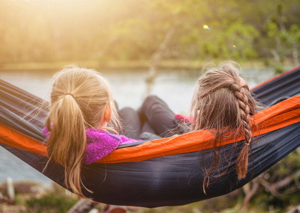 Girls in hammock, summer holidays